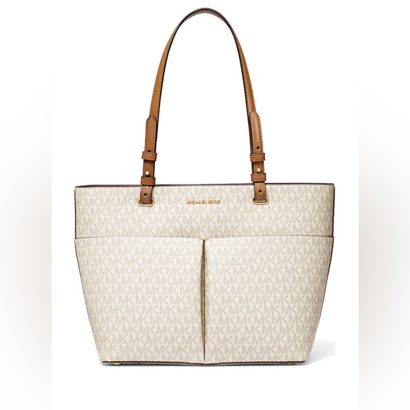 MICHAEL Michael Kors Tote
• Zip closure
• Double handles

• 14" W × 10" H × 5" D - Picture 1 of 5